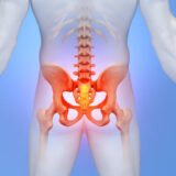 3D image of lower back pain on blue background